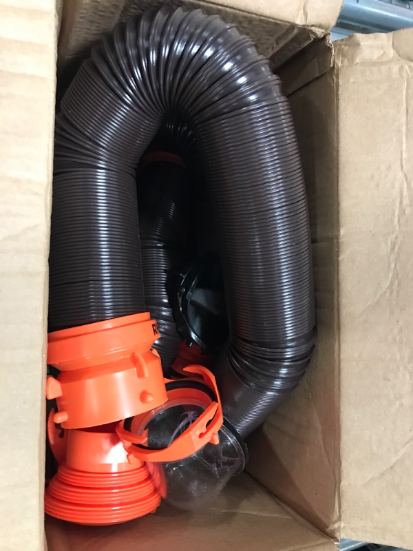 Photo 1 of Camco RhinoFLEX RV Sewer Hose Kit with Swivel Transparent Elbow and 4-in-1 Dump Station Fitting, Brown, 15 Feet (39770) 15ft Sewer Hose Kit Frustration-Free Packaging