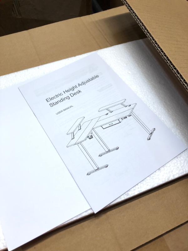 Photo 1 of l63 electric height adjustable standing desk