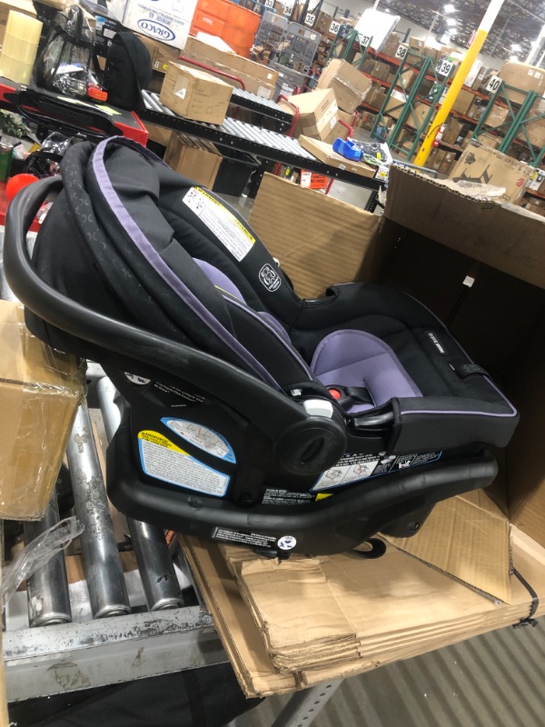 Photo 4 of * used * 
Graco SnugRide SnugLock 35 LX Featuring TrueShield Technology, Ion Black