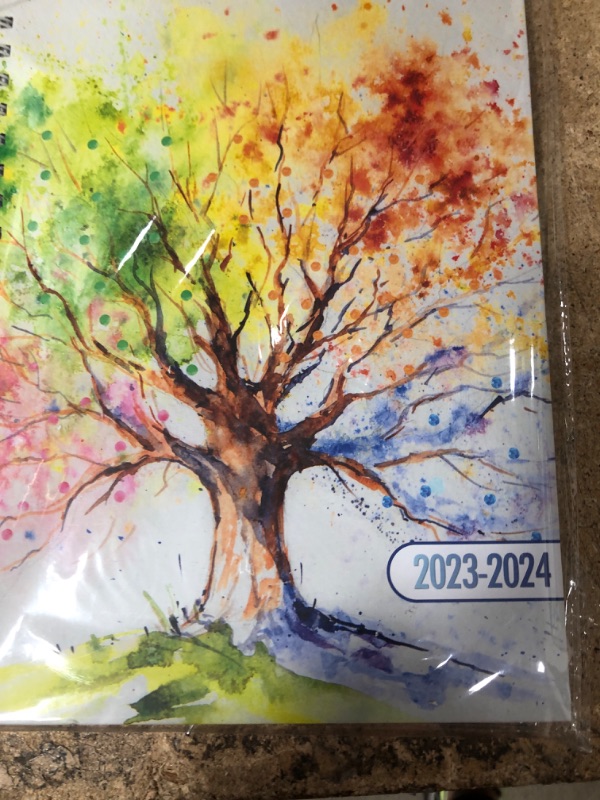 Photo 2 of Hardcover Academic Year 2023-2024 Planner: (July 2023 Through June 2024) 8.5"x11" Daily Weekly Monthly Planner Yearly Agenda. Bookmark, Pocket Folder and Stickers Set (Tree Seasons)