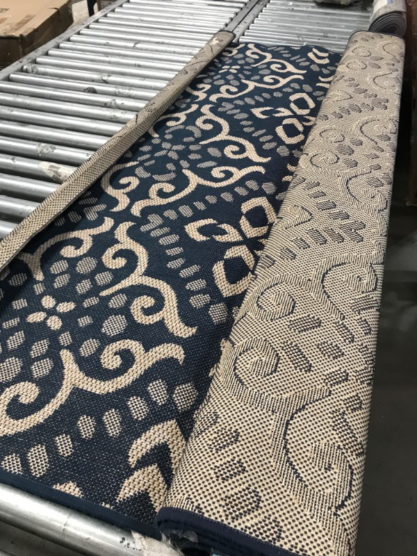 Photo 1 of 5'3 x 7 blue pattern indoor/outdoor area rug