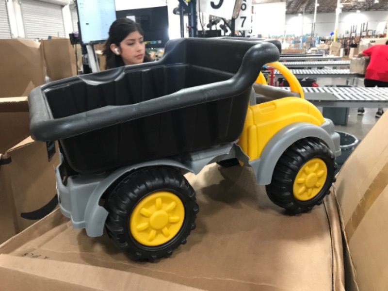 Photo 2 of American Plastic Toys Kids’ Yellow Gigantic Dump Truck, Tilting Dump Bed, Knobby Wheels, and Metal Axles Fit for Indoors and Outdoors, Haul Sand, Dirt, or Toys, for Ages 2+