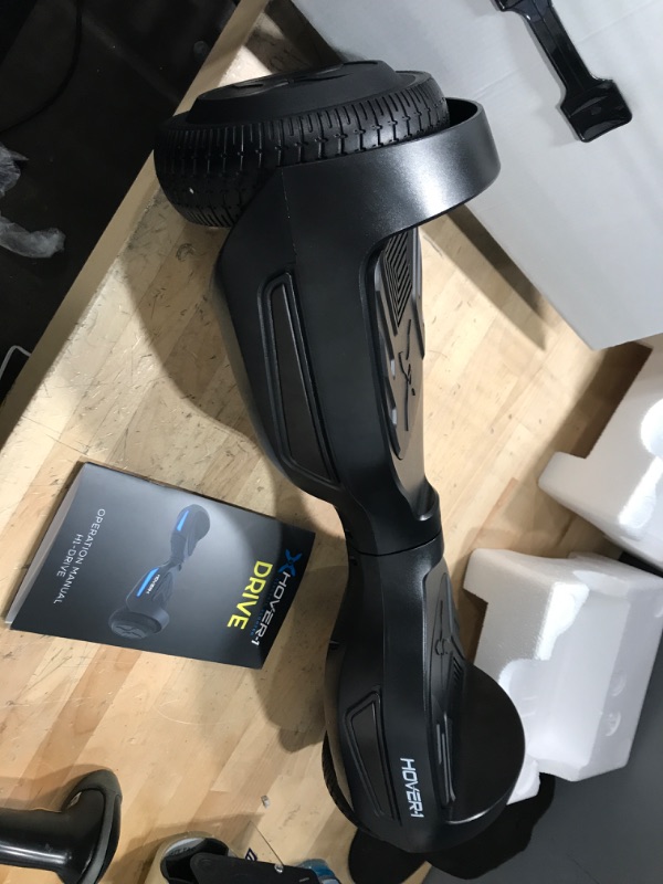 Photo 2 of (USED FOR PARTS ONLY!!!) Hover-1 Drive Electric Hoverboard | 7MPH Top Speed, 3 Mile Range, Long Lasting Lithium-Ion Battery, 6HR Full-Charge, Path Illuminating LED Lights Black