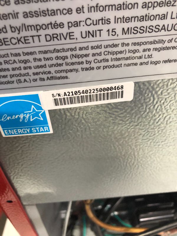 Photo 6 of ***DAMAGED - NONFUNCTIONAL - SEE NOTES***
Red mini fridge with silver trim - 1.6 Cubic feet capacity RED Fridge