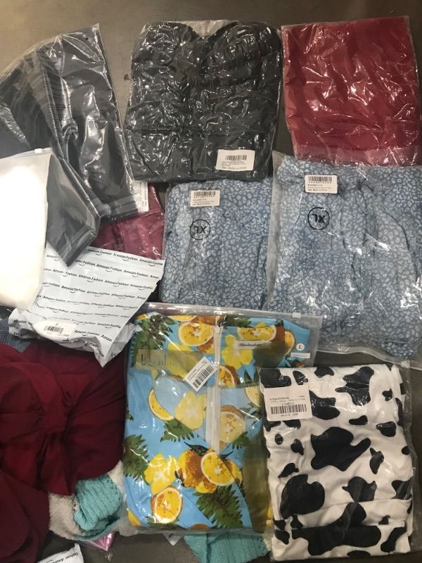 Photo 1 of BUNDLE OF 15  WOMENS LG/XL CLOTHING ITEMS