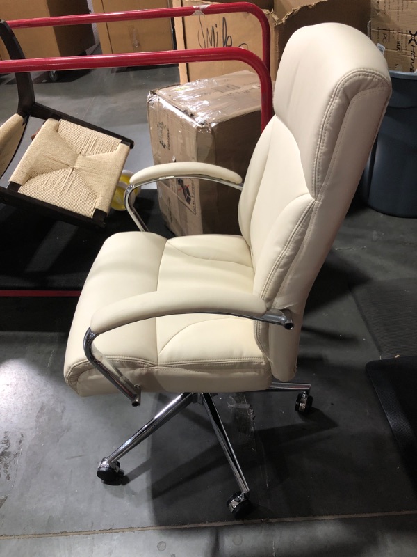 Photo 3 of * item used * damaged * see all images *
Amazon Basics Modern Executive Chair, 275lb Capacity with Oversized Seat Cushion, Ivory Bonded Leather