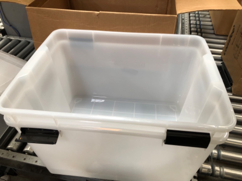 Photo 3 of **DAMAGE**IRIS USA 74 Quart WEATHERPRO Plastic Storage Box with Durable Lid and Seal and Secure Latching Buckles, Weathertight, Clear with Black Buckles, 2 Pack, 585449 74 Qt. - 2 Pack