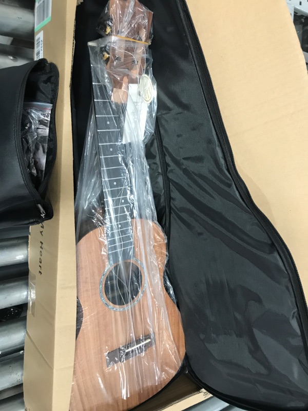 Photo 3 of ***ACCESSORIES MISSING - STRINGS DAMAGED - SEE PICTURES***
Caramel CB207 Acacia Baritone Acoustic Electric Ukulele with Truss Rod