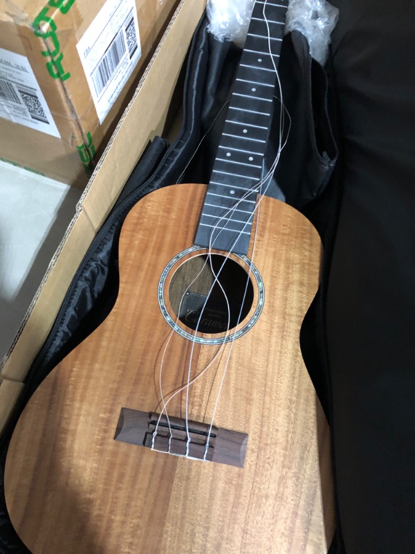 Photo 7 of ***ACCESSORIES MISSING - STRINGS DAMAGED - SEE PICTURES***
Caramel CB207 Acacia Baritone Acoustic Electric Ukulele with Truss Rod