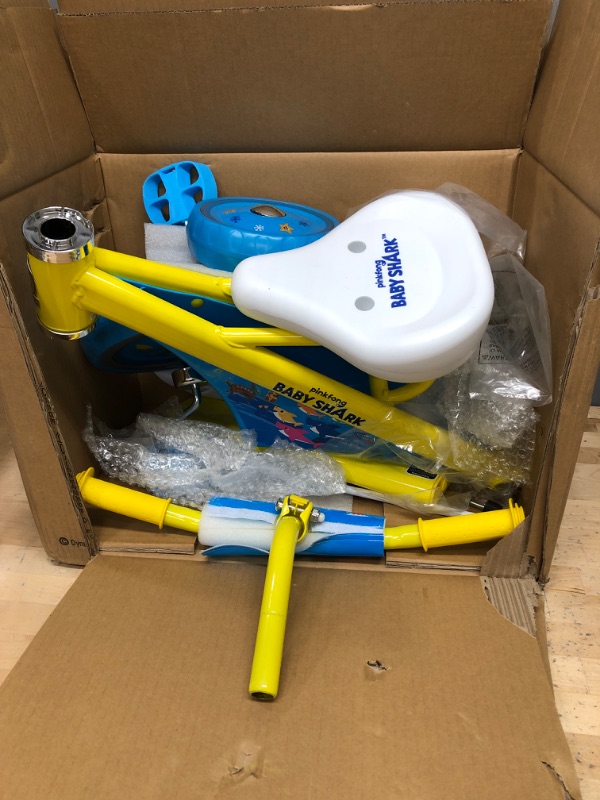 Photo 3 of **HARDWARE INCOMPLETE***
Dynacraft Baby Shark Trike with Sturdy Steel Frame for Ages 2-4 Yellow, 10"
