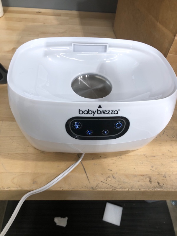 Photo 2 of Baby Brezza Baby Bottle Sterilizer and Dryer Advanced – Electric Steam Sterilization Machine – Universal Sterilizing for All Bottles: Plastic + Glass + Pacifiers + Breast Pump Parts - HEPA Filtration