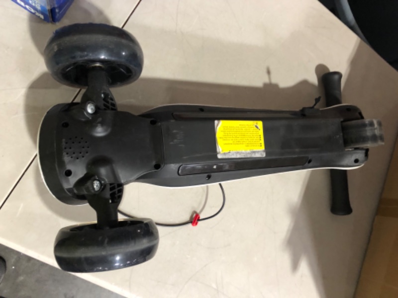 Photo 4 of *USED* PARTS ONLY* Elecorange Kid Electric Scooter, Safe Wide Light Up Deck & Wide Wheels, Reliable Thumb Throttle, 3 Adjustable Height, 5Mph Safe Speed, 60min Ride Time, Lightweight, Foldable, Scooter for Kids Ages 3-9