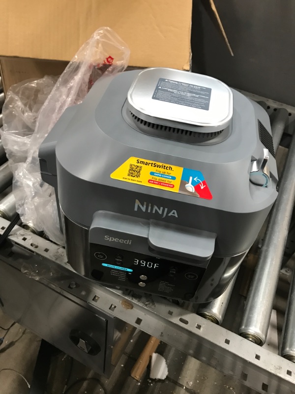 Photo 2 of Ninja OL501 Foodi 6.5 Qt. 14-in-1 Pressure Cooker Steam Fryer with SmartLid, that Air Fries, Proofs & More, with 2-Layer Capacity, 4.6 Qt. Crisp Plate & 25 Recipes, Silver/Black
