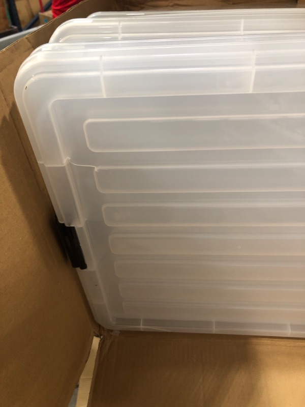 Photo 2 of *Minor Damage* IRIS USA 144 Qt./36 Gal. Plastic Storage Container Bin with Secure Lid and Latching Buckles, 3 pack - Clear, Durable Stackable Nestable Organizing Tote Tub Box Sport General Organization Garage Large Clear 144 Qt. - 3 Pack