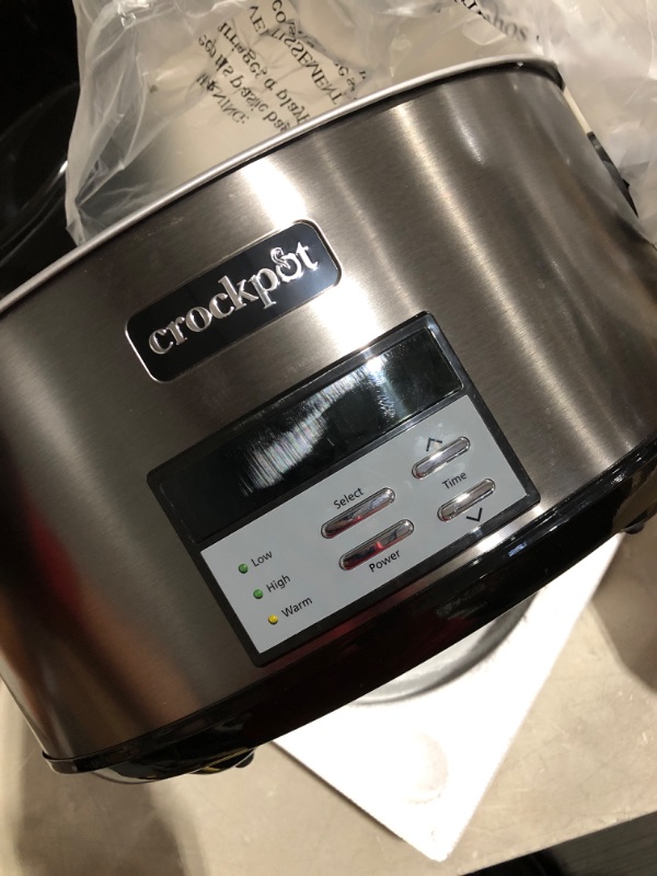 Photo 4 of * powers on * does not produce heat * sold for parts * 
Crockpot 8 Quart Slow Cooker with Auto Warm Setting and Cookbook, Black Stainless Steel