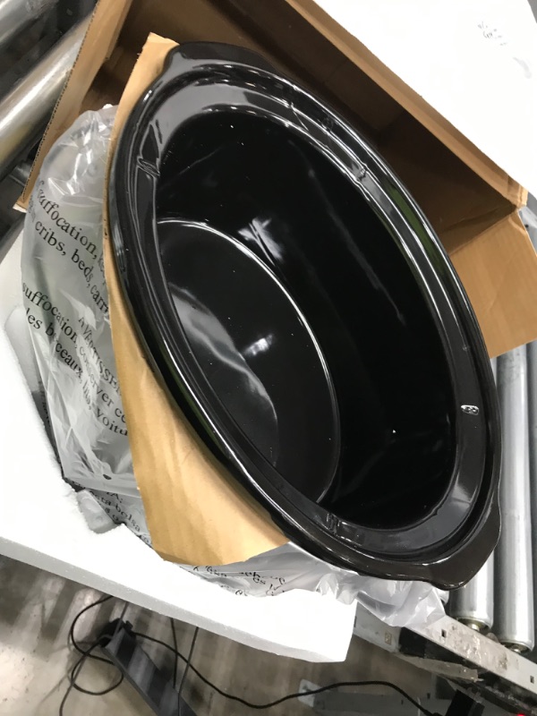 Photo 2 of * powers on * does not produce heat * sold for parts * 
Crockpot 8 Quart Slow Cooker with Auto Warm Setting and Cookbook, Black Stainless Steel