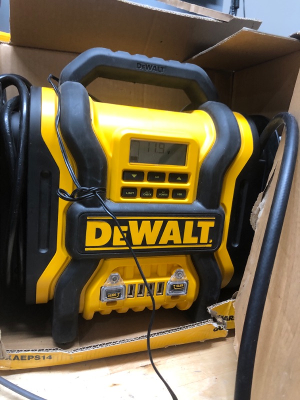 Photo 2 of DEWALT DXAEPS14 1600 Peak Battery Amp 12V Automotive Jump Starter/Power Station with 500 Watt AC Power Inverter, 120 PSI Digital Compressor, and USB Power , Yellow