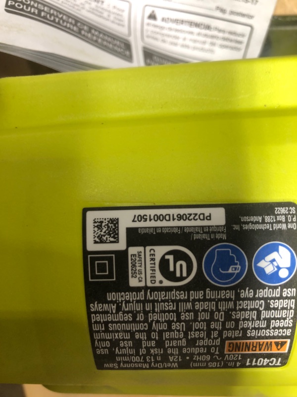 Photo 1 of **POWERS ON**
4" Hand-Held AC Tile Saw