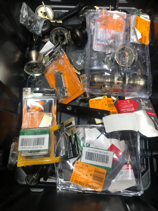 Photo 1 of ASSORTMENT OF DOOR HANDLES AND DOOR KNOBS 