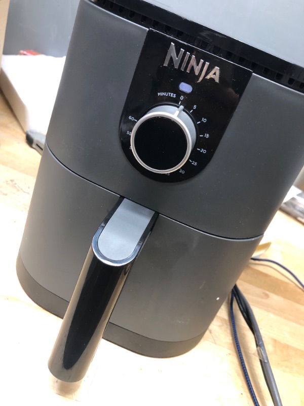 Photo 2 of **POWERS ON AND HEATS**
Ninja AF080 Mini Air Fryer, 2 Quarts Capacity, Compact, Nonstick, with Quick Set Timer, Grey