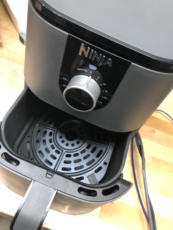 Photo 3 of **POWERS ON AND HEATS**
Ninja AF080 Mini Air Fryer, 2 Quarts Capacity, Compact, Nonstick, with Quick Set Timer, Grey
