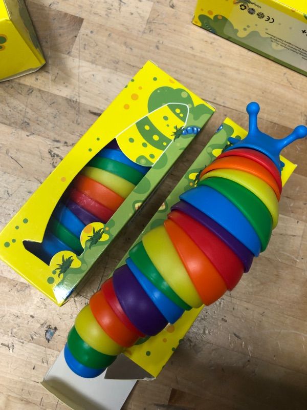 Photo 2 of 2 Fidget Slug Toys,3D Articulated Stretch Caterpillar Sensory Flexible Hand Toy, Ideal Party Favor Colorful Office Desk Pet Toys
