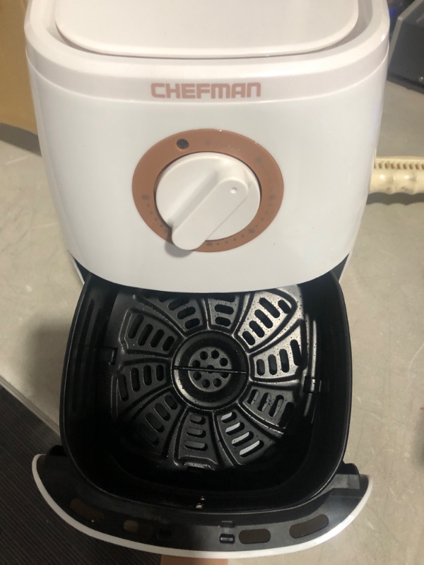 Photo 3 of * used item * powers on * unable to test further *
Chefman TurboFry 2-Quart Air Fryer, Dishwasher Safe Basket & Tray, Use Little to No Oil For Healthy Food,
