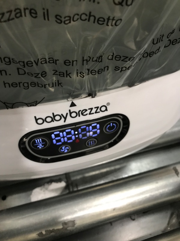 Photo 2 of Baby Brezza Baby Bottle Sterilizer and Dryer Advanced – Electric Steam Sterilization Machine – Universal Sterilizing for All Bottles: Plastic + Glass + Pacifiers + Breast Pump Parts - HEPA Filtration