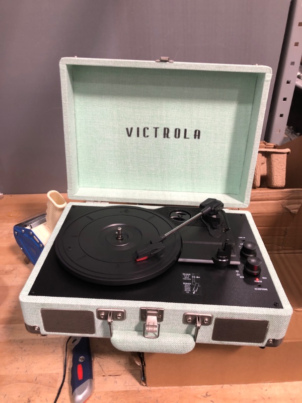 Photo 2 of Victrola Vintage 3-Speed Bluetooth Portable Suitcase Record Player with Built-in Speakers | Upgraded Turntable Audio Sound| Includes Extra Stylus | Light Mint Green Linen