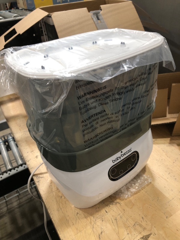 Photo 1 of Baby Brezza Baby Bottle Sterilizer and Dryer Advanced – Electric Steam Sterilization Machine – Universal Sterilizing for All Bottles: Plastic + Glass + Pacifiers + Breast Pump Parts - HEPA Filtration