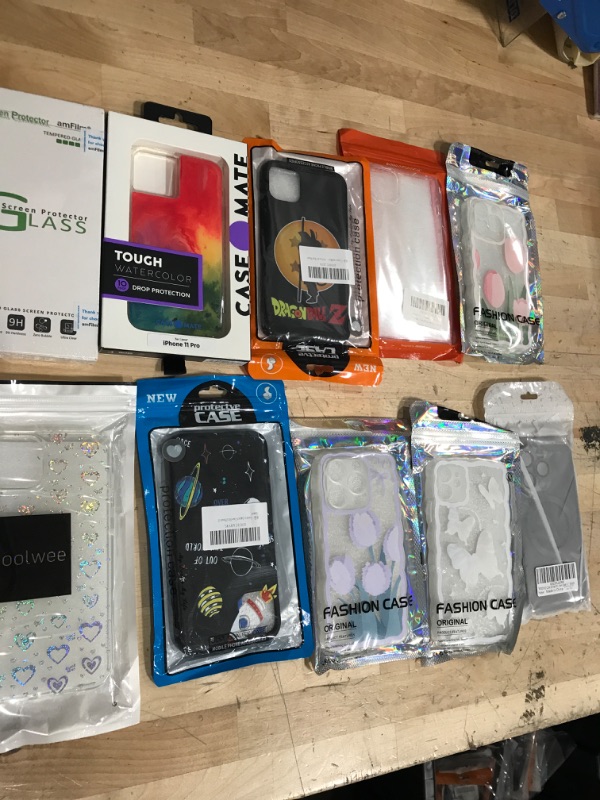 Photo 1 of miscellaneous bundle of assorted 10 phone cases and SCREEN PROTECTORS