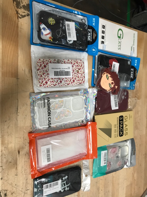 Photo 1 of miscellaneous bundle of assorted 10 phone cases and SCREEN PROTECTORS