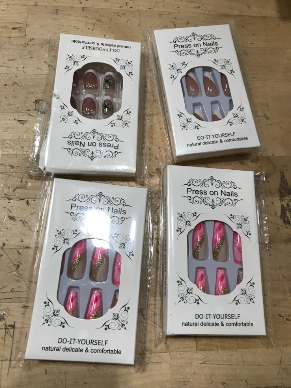 Photo 1 of ***Bundle of fake nails - 4 pack 