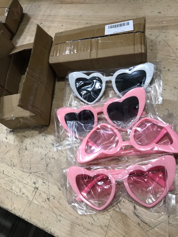 Photo 1 of 2 boxes - AOOFFIV Heart Shape Sunglasses Rimless Transparent Candy Color Heart Glasses Love Eyewear Party Favors(8805-4ps white 3*pink