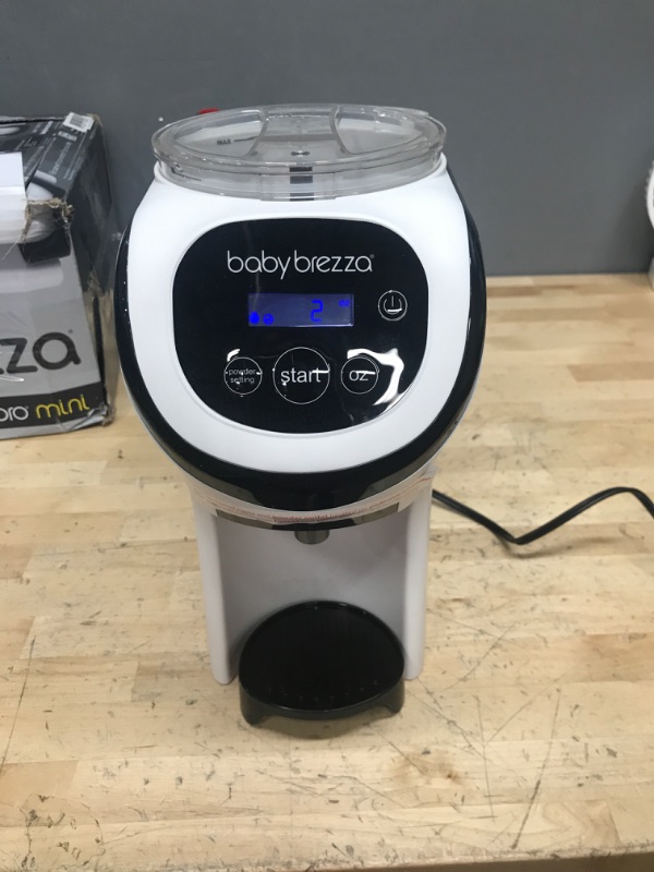 Photo 2 of Baby Brezza Formula Pro Mini Baby Formula Maker – Small Baby Formula Mixer Machine Fits Small Spaces and is Portable for Travel– Bottle Makers Makes The Perfect Bottle for Your Infant On The Go Formula Pro Mini Dispenser Machine