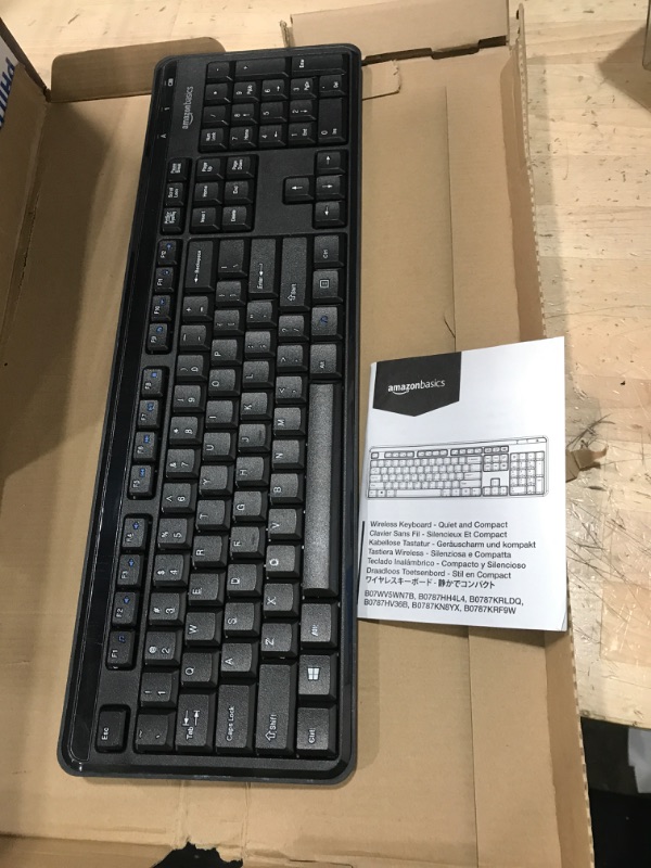 Photo 1 of Amazon Basics Wireless Keyboard-Quiet and Compact-US Layout (QWERTY)