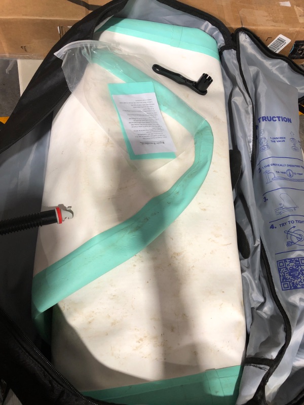 Photo 2 of * damaged item * sold for parts or repair *
Mint Green Inflatable paddleboard with Paddle, Pump, and Black Carry Case