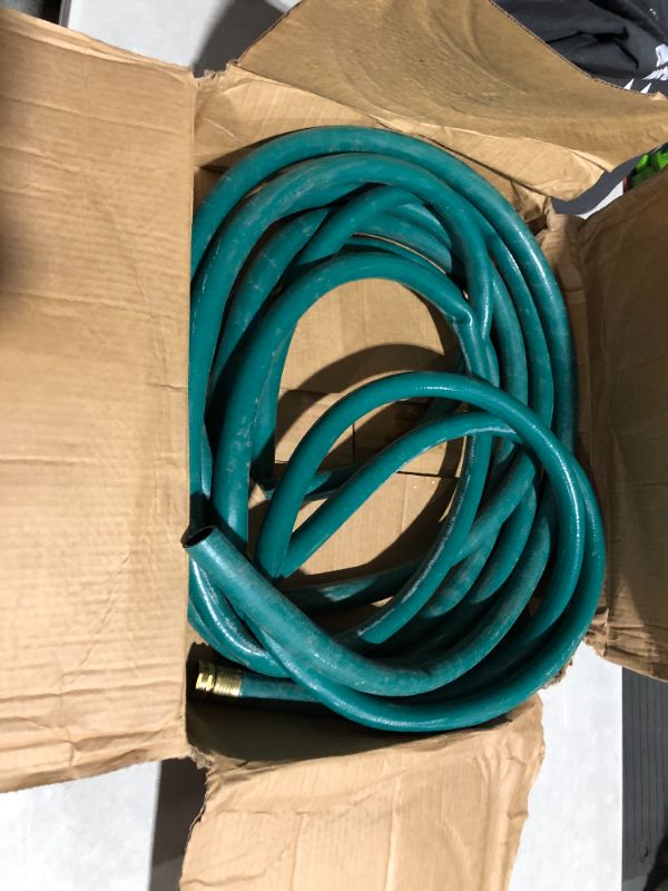 Photo 1 of ***ONE OF THE ENDS HAS BEEN CUT OFF - SEE PICTURES - HEAVILY USED***
Garden Hose, Green, 25 Ft