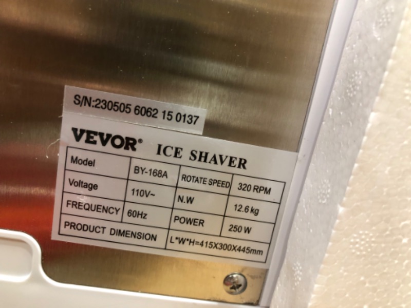 Photo 3 of **NOT FUNCTIONAL**VEVOR Ice Shaver Machine Electric, Snow Cone Machine Commercial 265 LBS/H, Shaved Ice Machine w/Ice Hopper & Lid, 250W Ice Crusher w/Drain Pipe Tabletop Shaved Ice Maker w/Adjustable Fineness White
