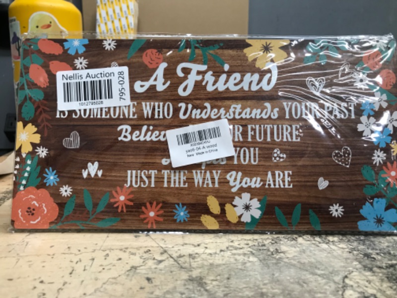 Photo 1 of A FRIEND quote hanging frame