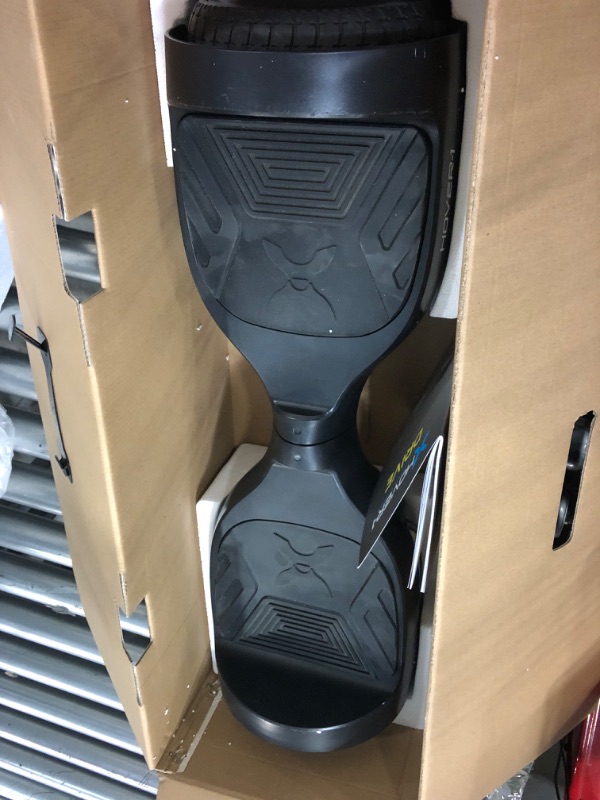 Photo 3 of **USED**
Hover-1 Drive Electric Hoverboard | 7MPH Top Speed, 3 Mile Range, Long Lasting Lithium-Ion Battery, 6HR Full-Charge, Path Illuminating LED Lights Black