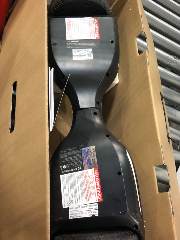 Photo 5 of **USED**
Hover-1 Drive Electric Hoverboard | 7MPH Top Speed, 3 Mile Range, Long Lasting Lithium-Ion Battery, 6HR Full-Charge, Path Illuminating LED Lights Black