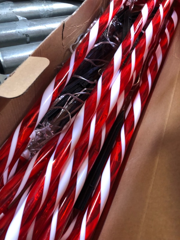 Photo 4 of 28” Candy Cane Lights Outdoor Pathway, 42 Feet in Total Length with 12 Pack Candy Cane Pathway Lights with Shiny Star for Outside Christmas Decorations, 10 LED Lights in Each Light Up Candy Canes 12 Pcs Star