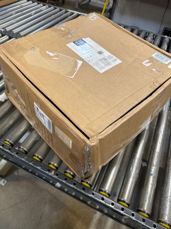Photo 1 of Amazon Basics Mesh, Mid-Back, Adjustable, Swivel Office Desk Chair with Armrests, Black -- possibly missing some of the screws due to it being loose inside the box 