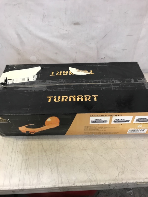 Photo 1 of TURNART Wheel Lock Clamp Adjustable Anti-Theft Lock Clamp Boot Tire Claw for Parking Car Truck RV Finger Pull