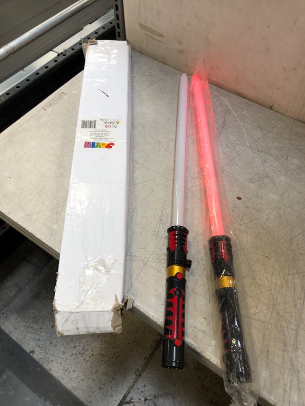 Photo 2 of Light Up Saber 2-in-1 LED FX Dual Red Light Swords Set with Sound ( USED ITEM ) (ONE LIGHT SABER DOESN'T WORK )