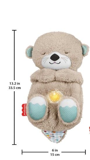 Photo 2 of Fisher-Price Play Snuggle Otter plush sound machine plays 30 mins of gentle music and sounds with a light and calming breathing motion