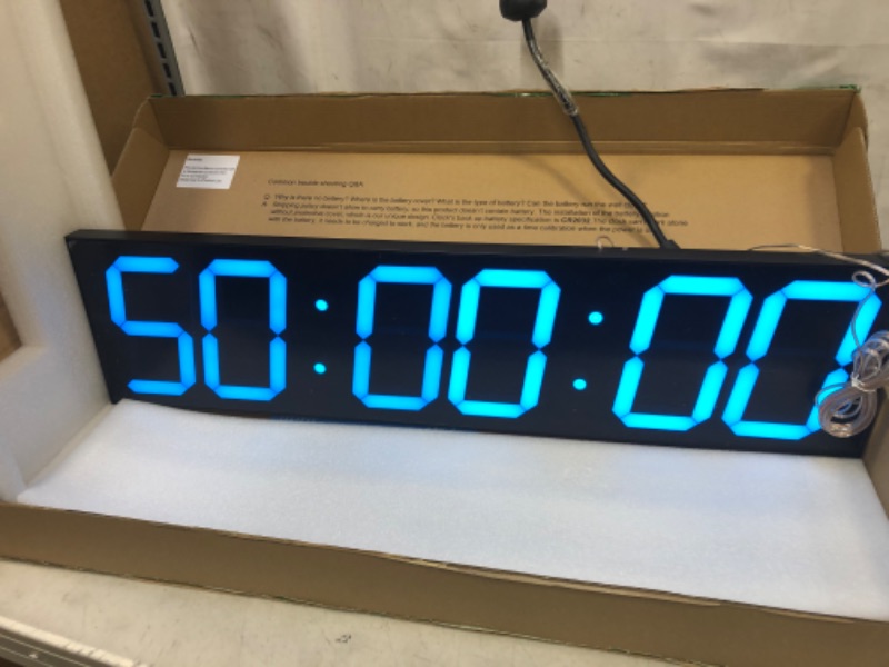 Photo 1 of CHKOSDA Digital Wall Clock, Oversize Led Digital Clock with Auto Dimmer, Huge Countdown Timer with Remote Control, 27" Wide Led Display, 6 Digits, Wall Mount, Date and Temperature (Ice Blue)
