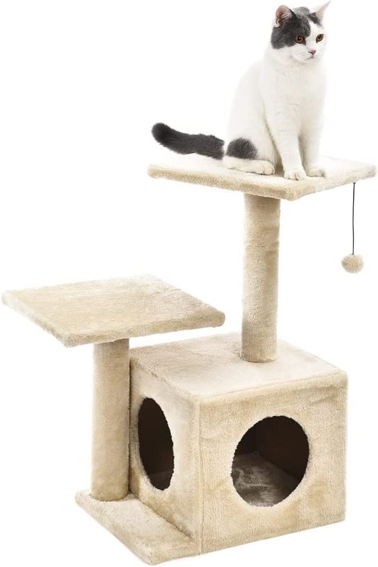 Photo 1 of Amazon Basics Dual Post Indoor Cat Tree Tower With Cave - 23 x 18 x 29 Inches, Beige