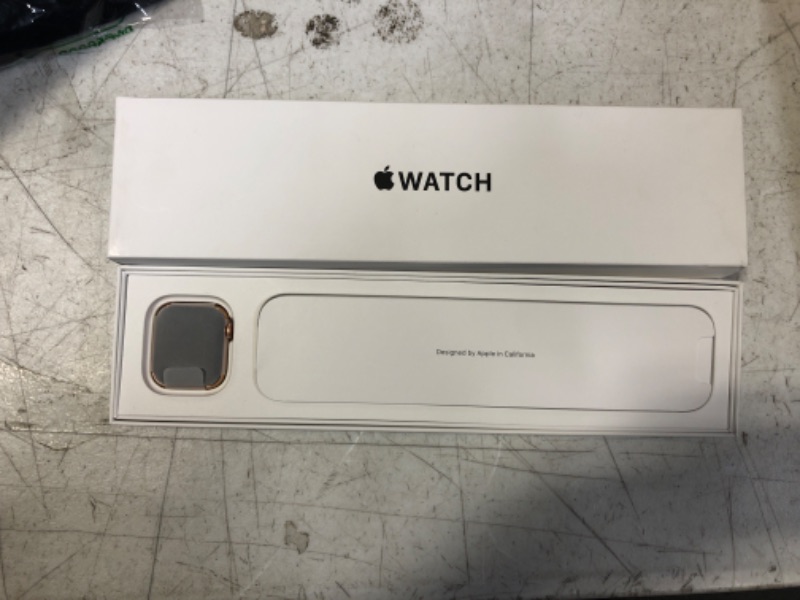 Photo 2 of Apple Watch SE (GPS + Cellular, 40mm) Gold Aluminum Case with Starlight Sport Band